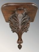 A reproduction mahogany wall bracket, width 37 cm.