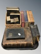 A group of antiquarian bibles, methodist hymn books, further volumes.