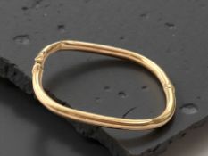 A 9ct gold bangle (misshapen) CONDITION REPORT: 5.