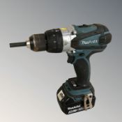 A Makita drill with battery pack.