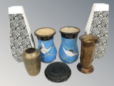 A pair of oriental pottery vases depicting herons in flight,