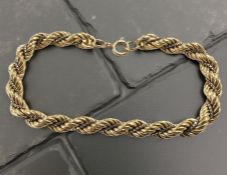 A 9ct gold two-tone ropetwist bracelet, length 20cm. CONDITION REPORT: 13.