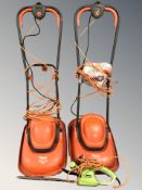 Two Flymo mowers and an electric hedge trimmer.