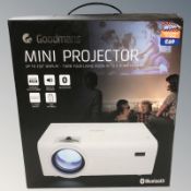 A Goodman's mini projector in box.