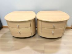 A pair of contemporary two drawer bedside stands, width 60 cm.