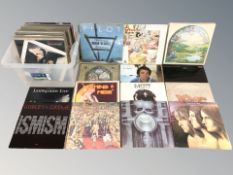 A collection of vinyl LP records including Queen, Lindisfarne, The Rolling Stones, Genesis, T-Rex,