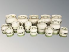 A collection of Kleen kitchenware ceramic storage jars, two sugar and flower sifters, etc.