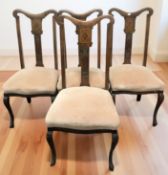 A set of four late Victorian inlaid mahogany dining chairs,