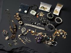 A collection of costume jewellery, some silver items, bangles,
