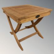 A Mandalay teak square occasional table, width 44 cm.