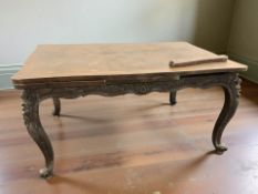 An early 20th century carved oak pull-out extending dining table, unextended 150 cm x 98 cm x 75 cm.