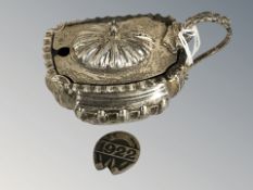 A silver mustard pot with blue glass liner. CONDITION REPORT: Silver 58g.