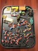 A group of painted lead soldiers, cavalry figures, military die cast dinky toys, etc.