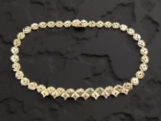 A 9ct gold fancy link necklace, length 43cm. CONDITION REPORT: 40.