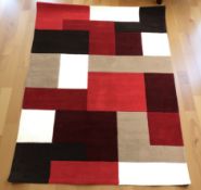 A brand new Lexus red ground 100% wool rug, 230 cm x 160 cm.