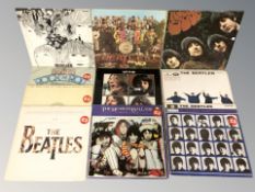 A small quantity of vinyl LP records by The Beatles.