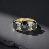 An antique sapphire and diamond ring, size N. CONDITION REPORT: 5.4g. Marks rubbed.