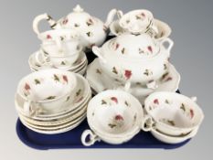Approximately twenty eight pieces of Victorian hand painted tea china decorated with bushels of