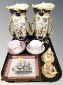 A pair of continental twin handled ceramic vases, pair of Royal Worcester blush ivory figures,