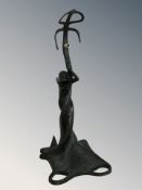 An Art Nouveau style patinated metal lamp base, height 44 cm.