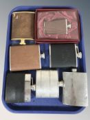 A group of hip flasks.