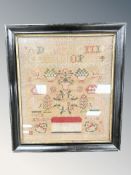 A 19th century tapestry sampler, 32 cm x 37 cm.