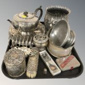 A group of EPNS items, silver backed dressing table brush and jar, silver thimble, etc.