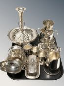 EPNS items including an egg cruet, twin handled cup, vase, sauceboats, etc.
