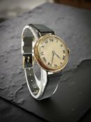 A vintage 18ct gold lady's wristwatch, case 26mm.