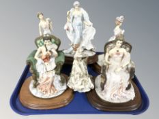 Six Leonardo Collection figurines.