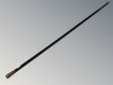 An ebonised swagger stick, length 71 cm.
