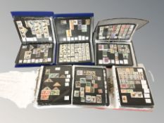 Five albums of world stamps.