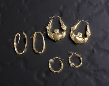 A pair of 9ct gold Claddagh earrings, length 38mm, plus two further pairs, also 9ct.