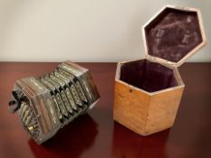 A Lachenal & Co hexagonal 48 key concertina, numbered 29779,