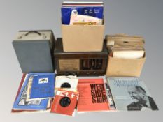 A vintage radio, Hanimex projector, assorted 78s and LPs.