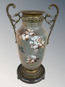 A twin-handled hand painted and brass mounted vase, height 39 cm,