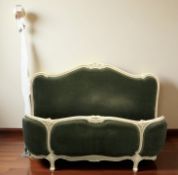 A French style painted bedframe.