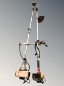 A Parker brand petrol strimmer and another similar