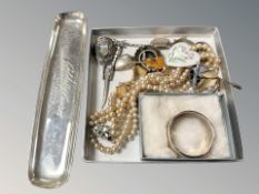 A silver napkin ring, other silver and white metal items, costume pearls and other trinkets.