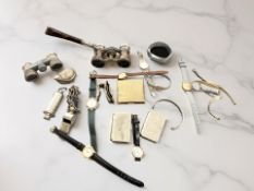Assorted items including watches, whistles,