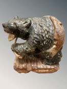 A Japanese carved wooden Hokkaido bear, signed to reverse, height 30 cm.