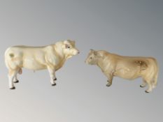 A John Beswick bull, height 15.5 cm, and a further Beswick bull.