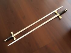 A pair of fraternity style swords signed Wilkinson Sword, London, length 90 cm.