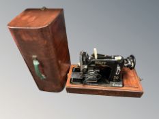 A Pfaff electric sewing machine.