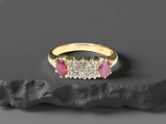 An antique 18ct yellow gold ruby and diamond ring, size M.