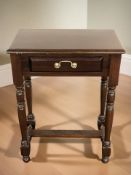 A reproduction mahogany side table fitted a drawer, width 61 cm.
