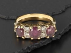 An 18ct gold ruby and diamond ring, size M CONDITION REPORT: 3.