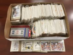 A large quantity of modern postcards, stamps, etc.