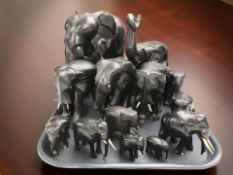 A group of African carved ebony elephants, tallest 24 cm.