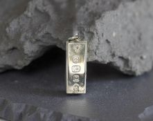 A silver ingot pendant, Sheffield 1977, 31g.